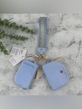 lululemon athletica Light Blue Double Pouch Wristlet with Gold Hardware